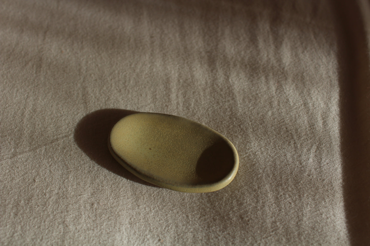 Handmade ceramic centring stone for mindfulness