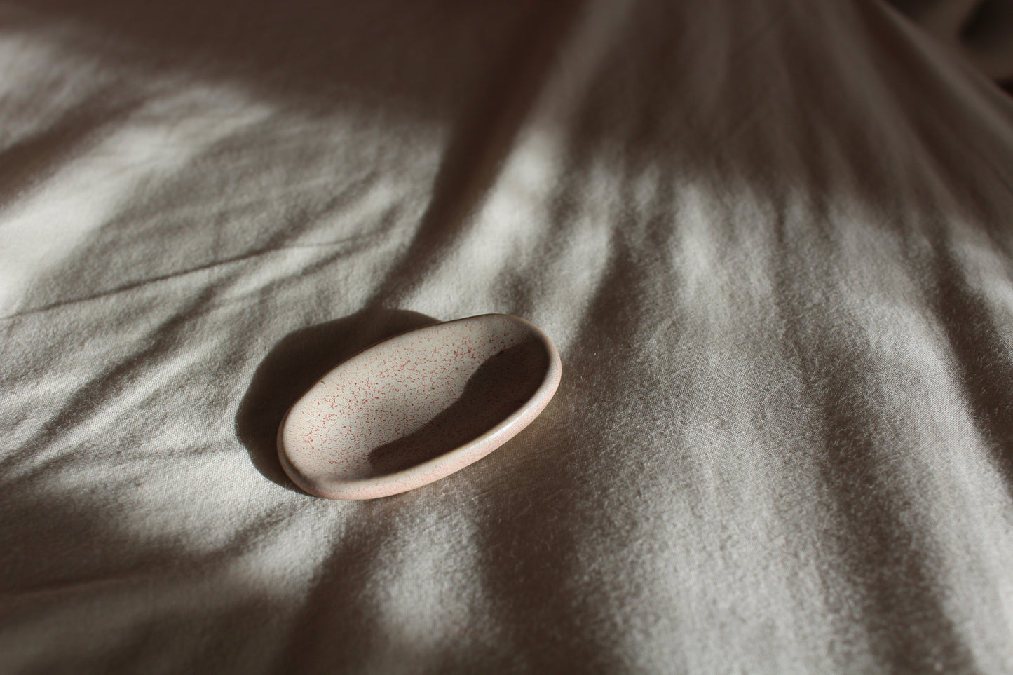 Handmade ceramic centring stone for mindfulness