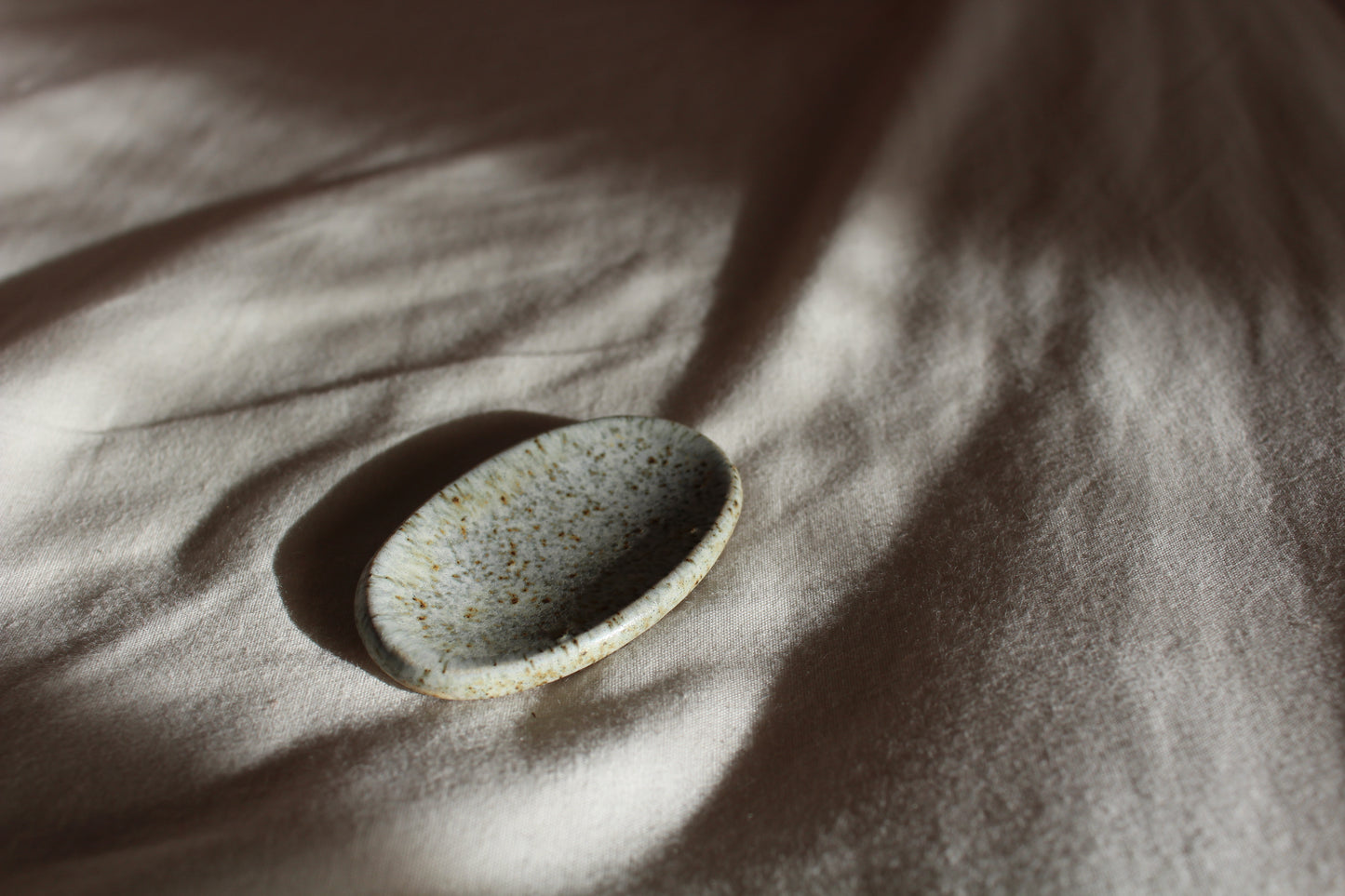 Handmade ceramic centring stone for mindfulness