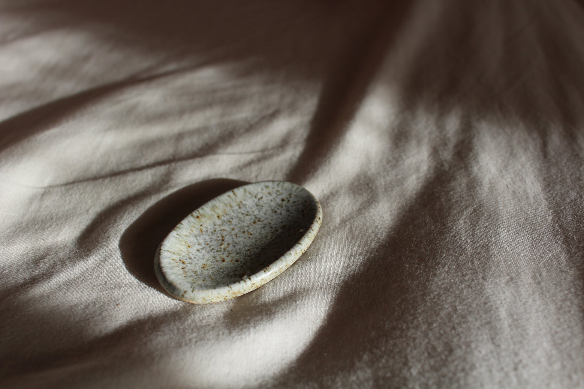 Handmade ceramic centring stone for mindfulness